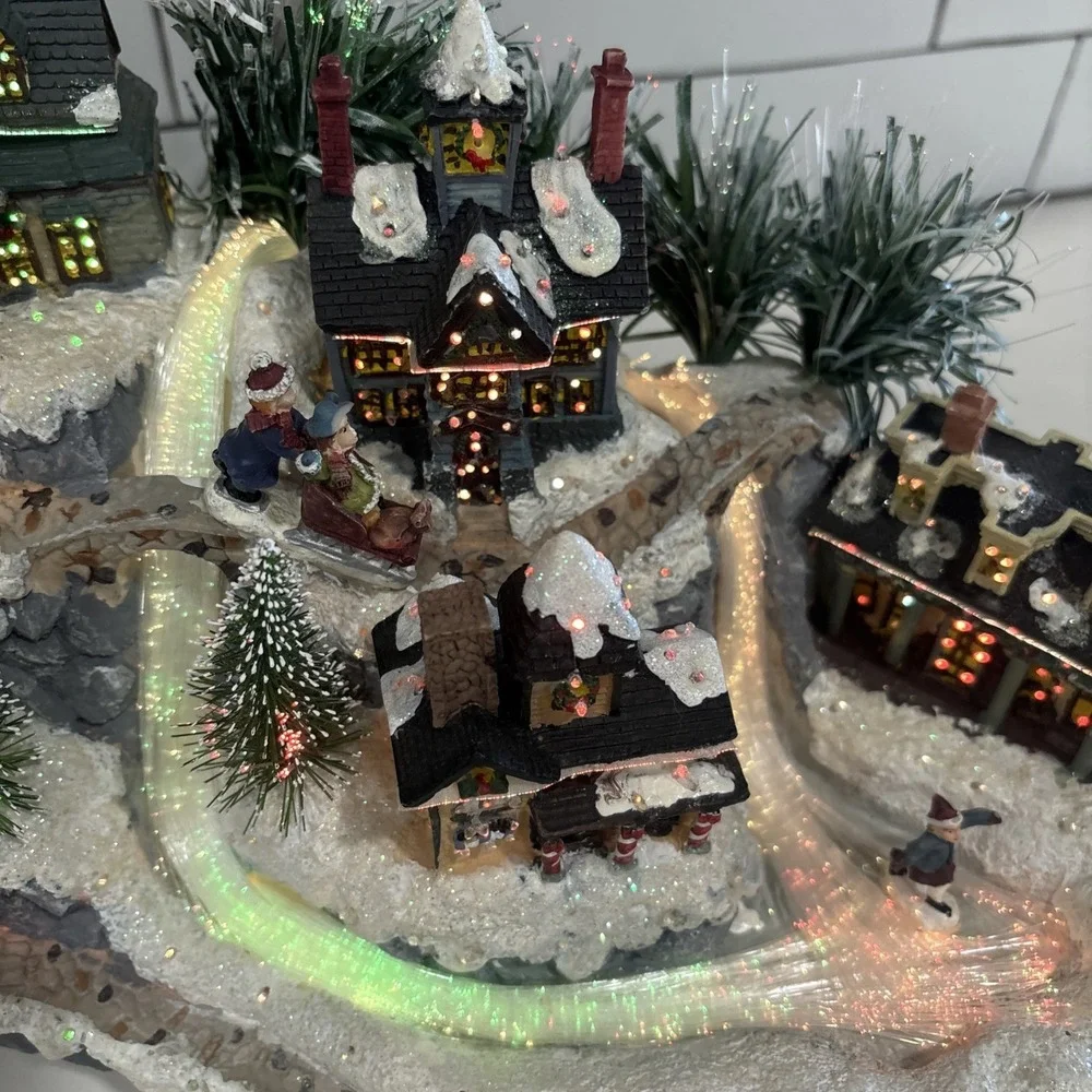 Beautiful vintage fiber optic Christmas village that light up the city-Avon 2003